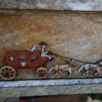 A Carriage Carving on Stone Tile